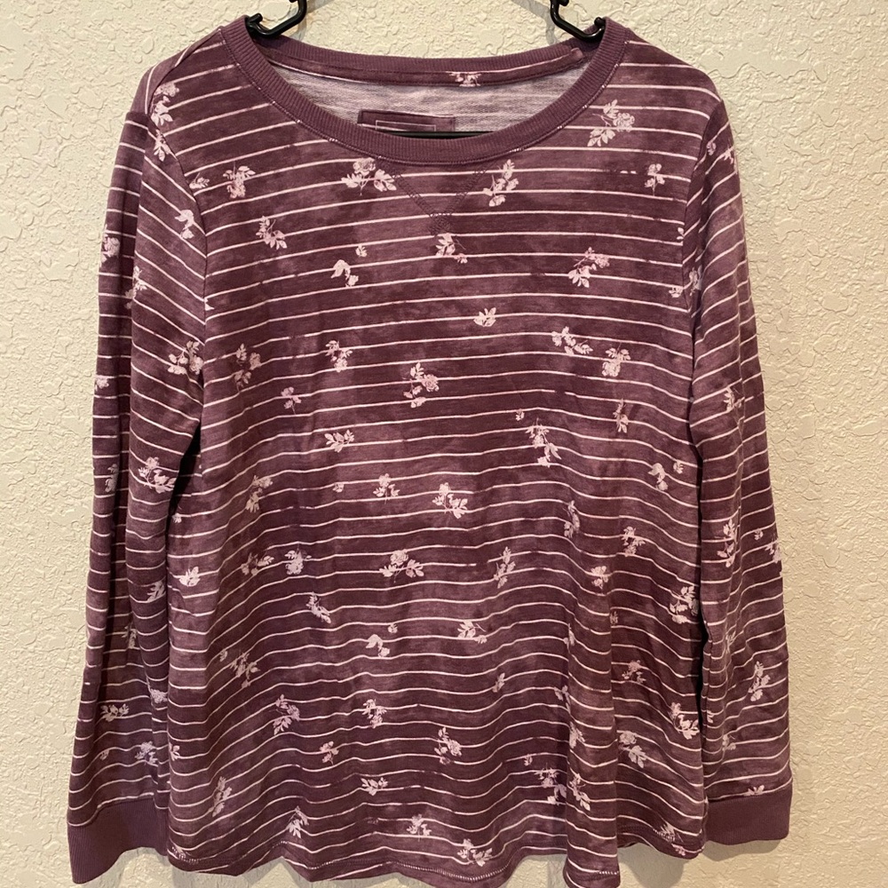 Women’s long sleeve shirt.